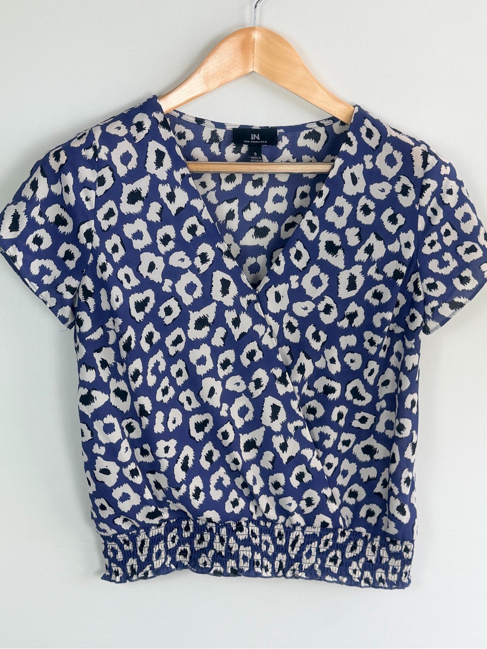 IN San Francisco Blue Leopard Print Surplice Blouse Smocked Hem Size Small